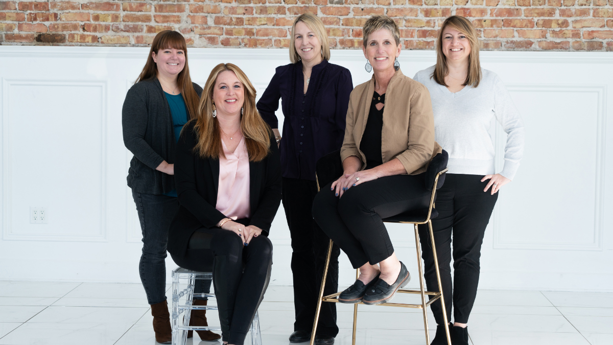 <i> Pictured from left to right: Kristen Rouse (Digital Director), Dena Frisch (Sales Manager), Barbara Krause (Publisher/CEO), Nadine Seitz (Advertising Coordinator & Accounting), Lauren Harrigan (Art Director).  </i>